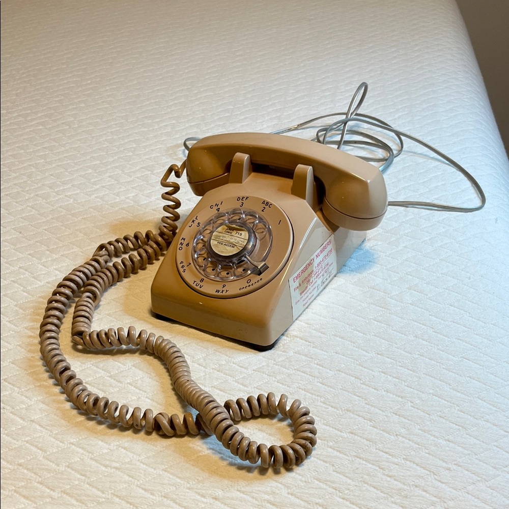 Stromberg-Carlson 1979 Vintage Rotary Dial Telephone peach, long cord hard wired